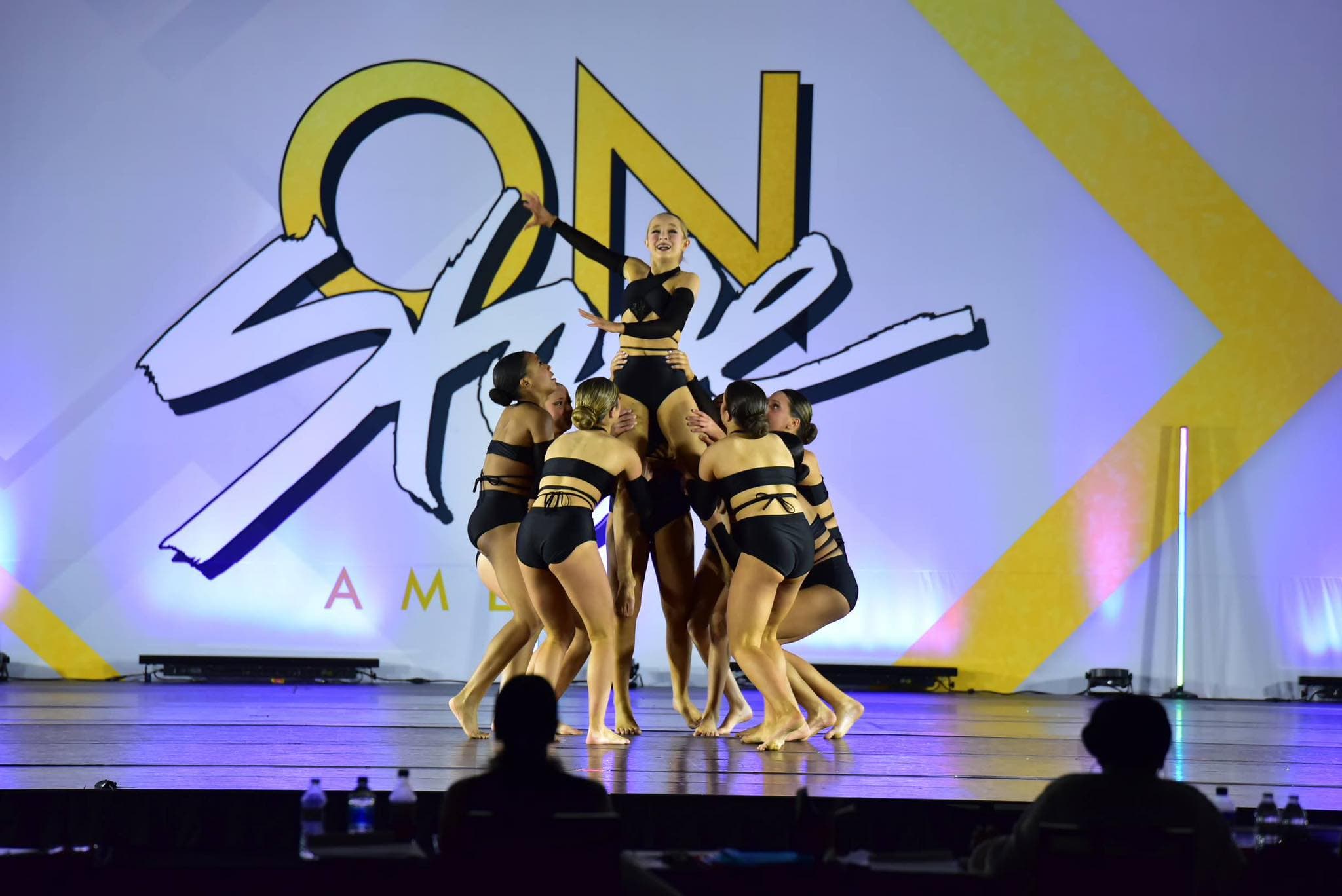 Dancers performing together on the On Stage America stage